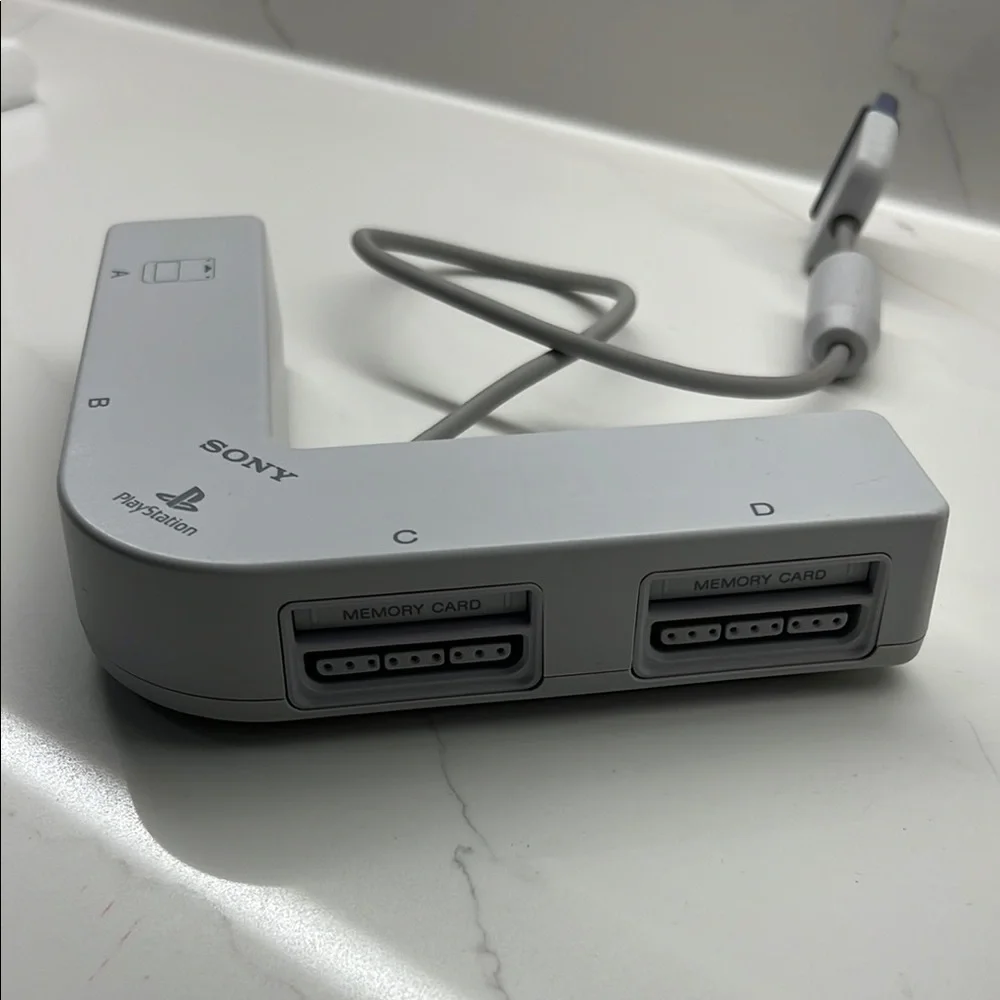 Sony PlayStation Gray Multi-Tap Adapter
